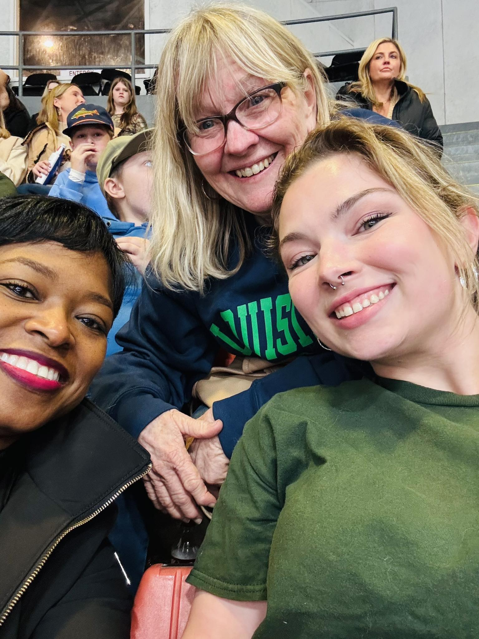 Three women posing.